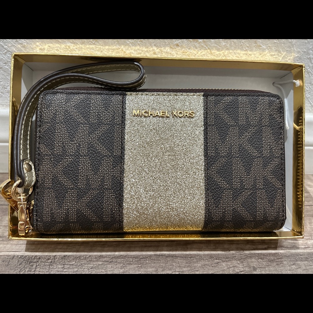 Brand new Logo Stripe Continental Wristlet